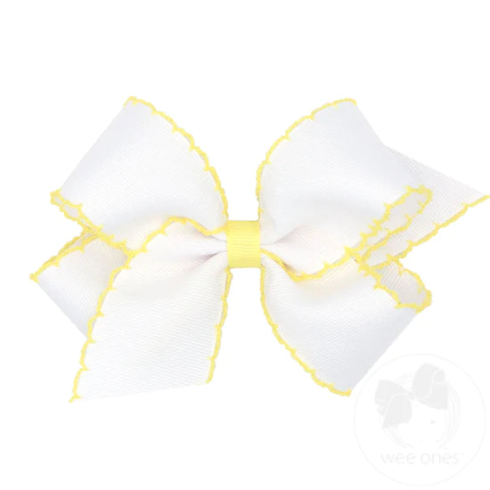 
            
                Load image into Gallery viewer, Medium Grosgrain Hair Bow with Contrasting Moonstitch Edges and Wrap - White with Light Yellow Trim
            
        