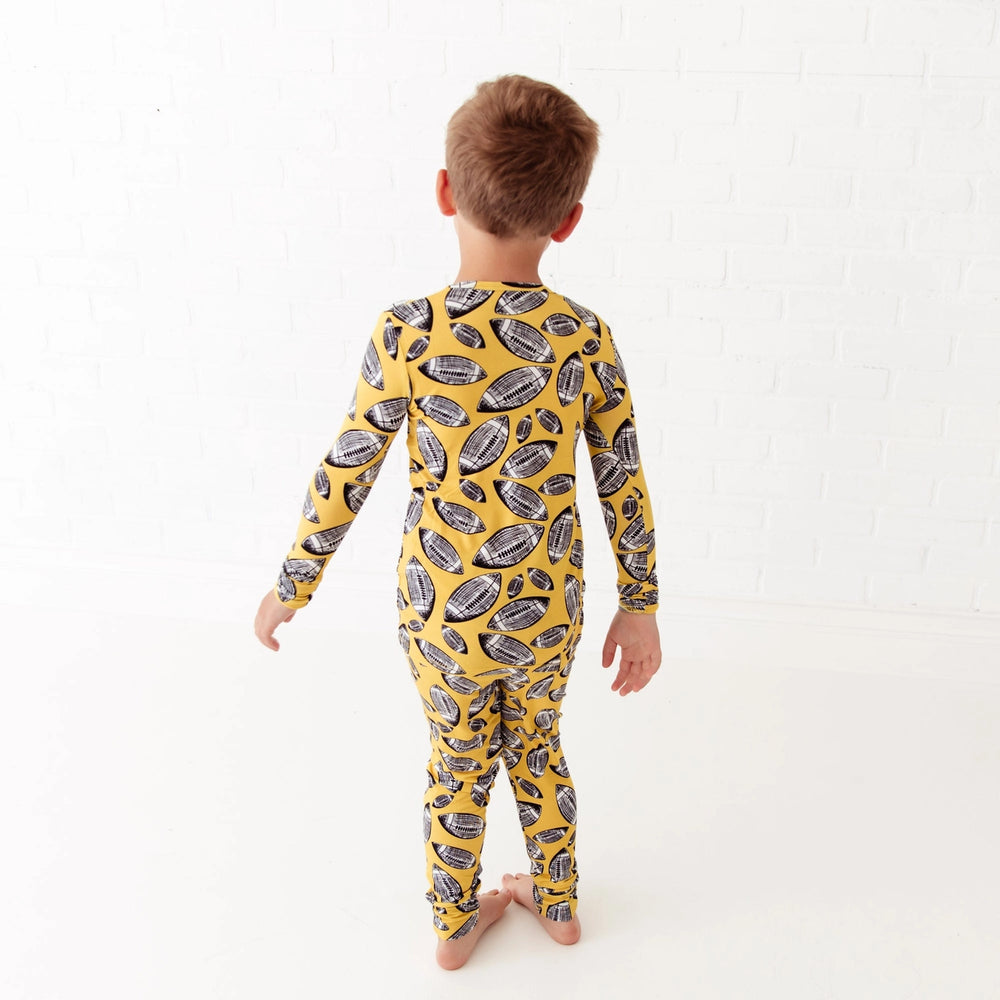 
            
                Load image into Gallery viewer, Kid&amp;#39;s Football Hit the Sack Bamboo Two Piece Pajamas Set
            
        