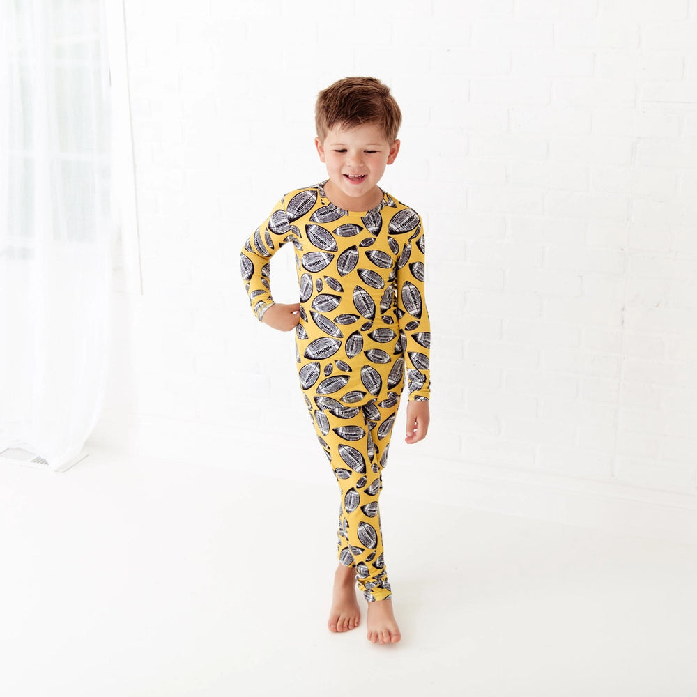 
            
                Load image into Gallery viewer, Kid&amp;#39;s Football Hit the Sack Bamboo Two Piece Pajamas Set
            
        