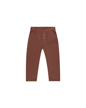 Super-soft slub knit pants with coconut button detail at center front. Featuring an elastic waistband, and a relaxed fit.

Color: Brick