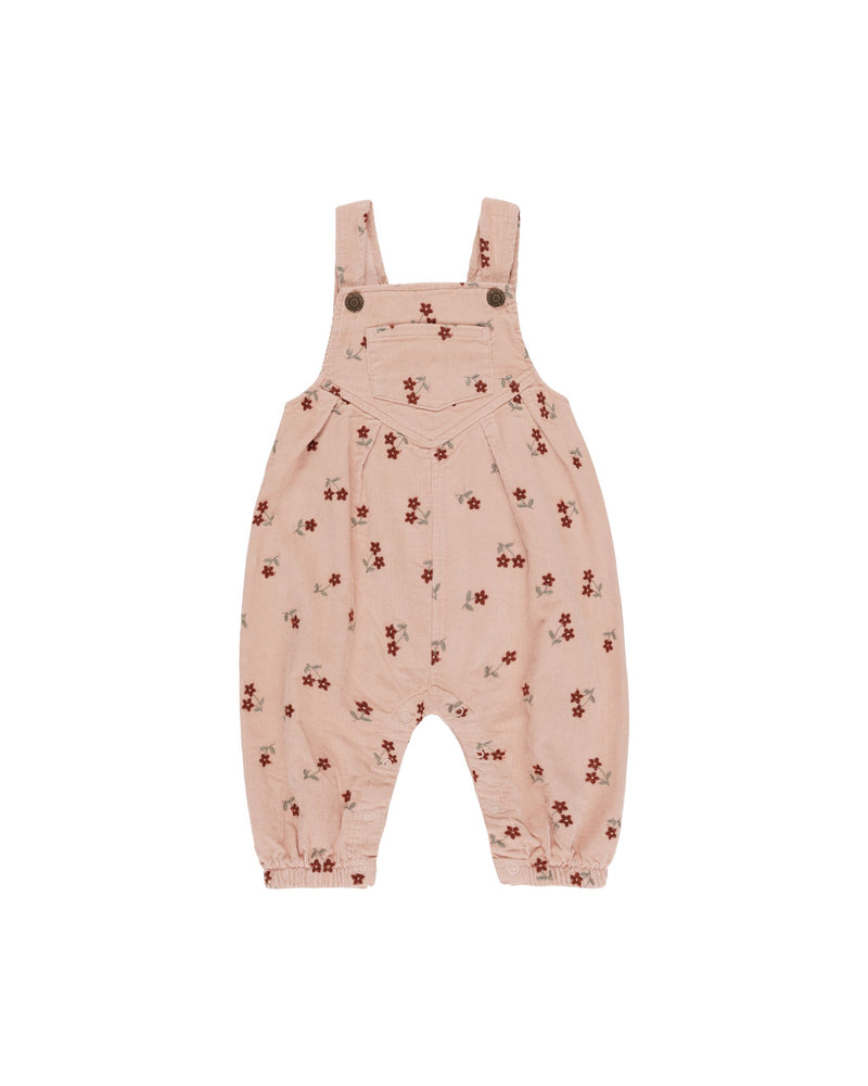 These vintage overalls are a classic look for little ones. Featuring shank buttons at the straps, back pockets, and a lot of cute. 

Featuring our 'blossom embroidery' all-over print on rose.